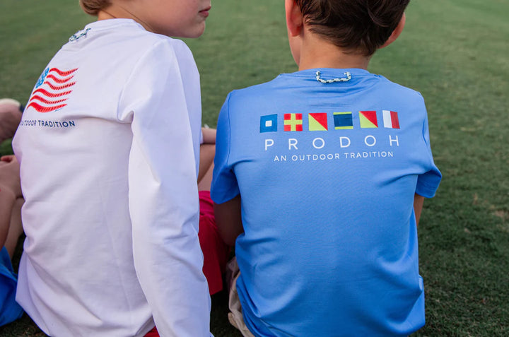 Kids Pro Performance Short Sleeve Fishing T-shirt- Marina Blue with Nautical Flags